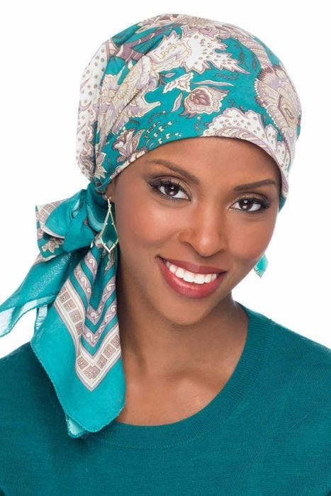 Woman in teal cotton floral head scarf for women