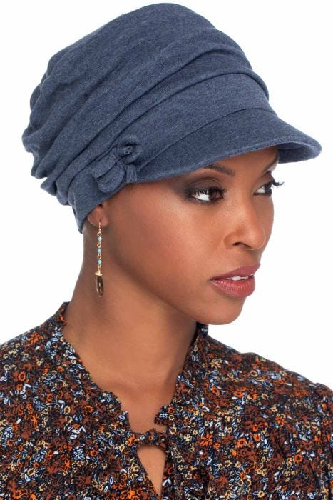 Woman in denim cotton cancer hat with brim and multiple pleats