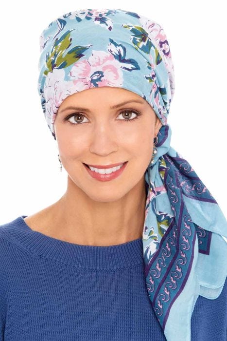 Woman in blue cotton floral head scarf for women
